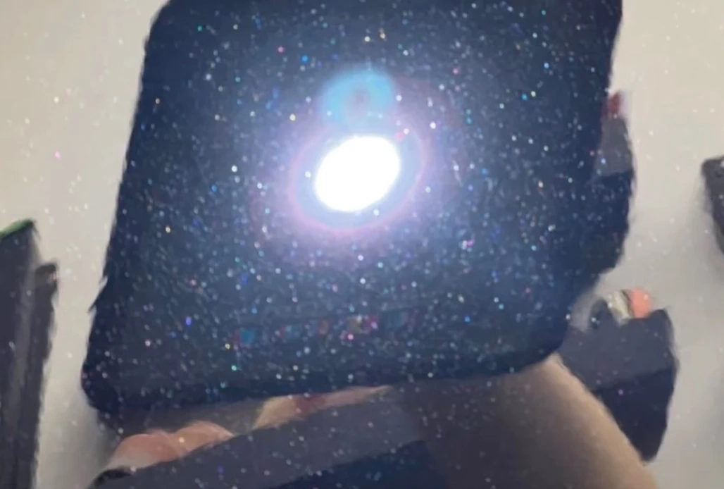 Corrected paint under torch light after polishing